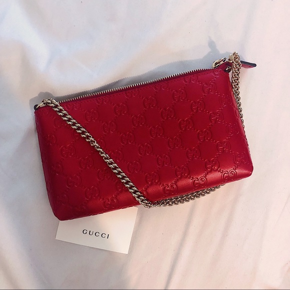 red gucci wallet on chain